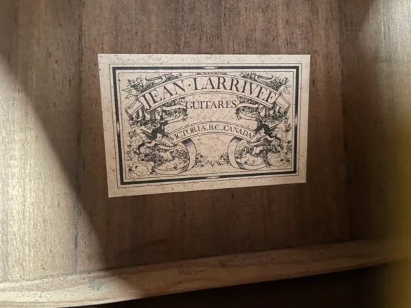 Stunning Made in Canada Jumbo acoustic. 1995. Solid cedar top with ornate koa back and sides. Very nice rosette and beautiful inlays on the fingerboard, and check out that headstock! Large, rich and loud tone with Fishman electronics. Some light general wear throughout as pictured, but nothing significant. Playing great with a fresh setup. Includes original hardshell case.